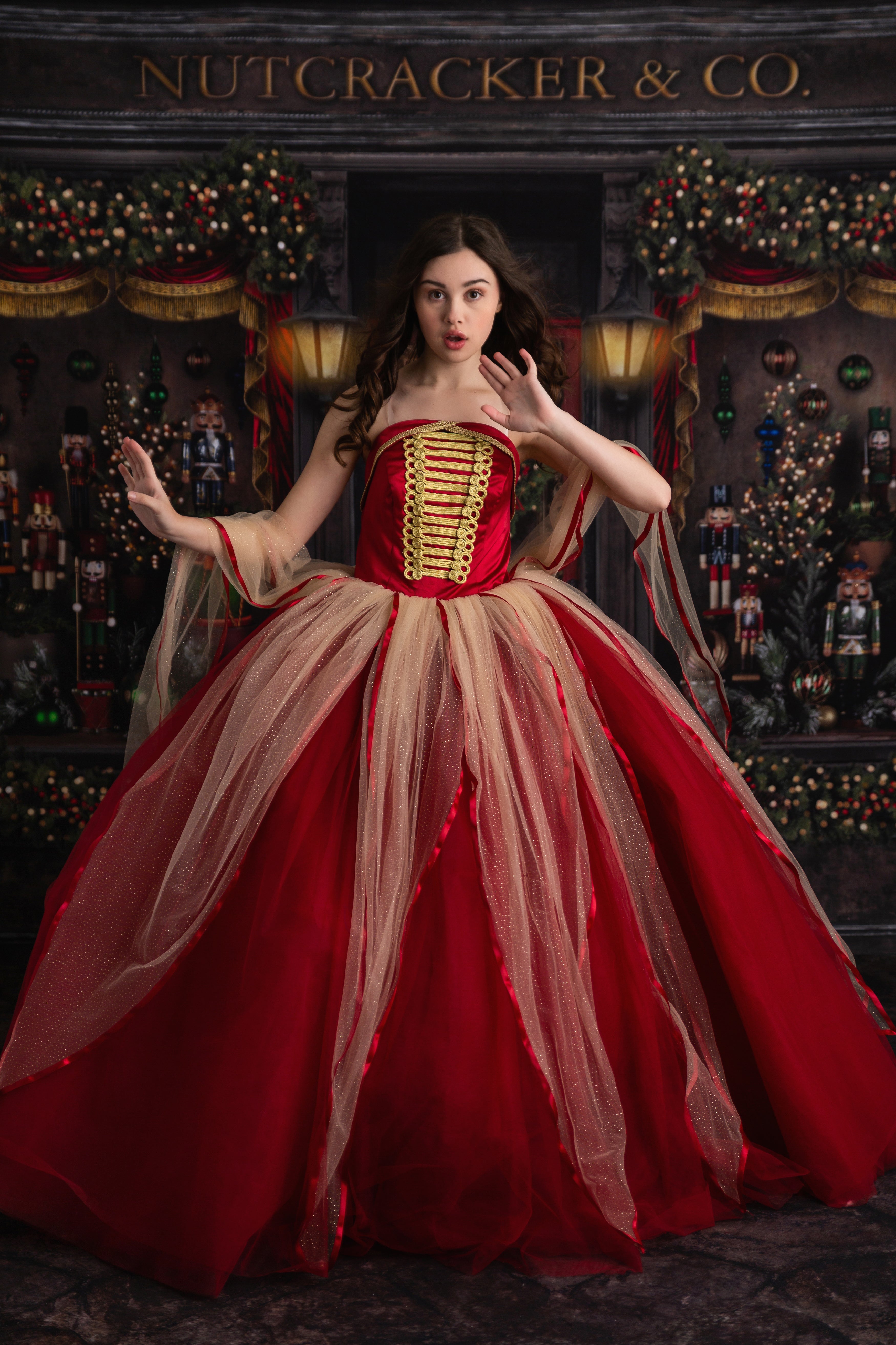 Girl twirling in the Nutcracker Ballet Princess gown with gold shimmer tulle