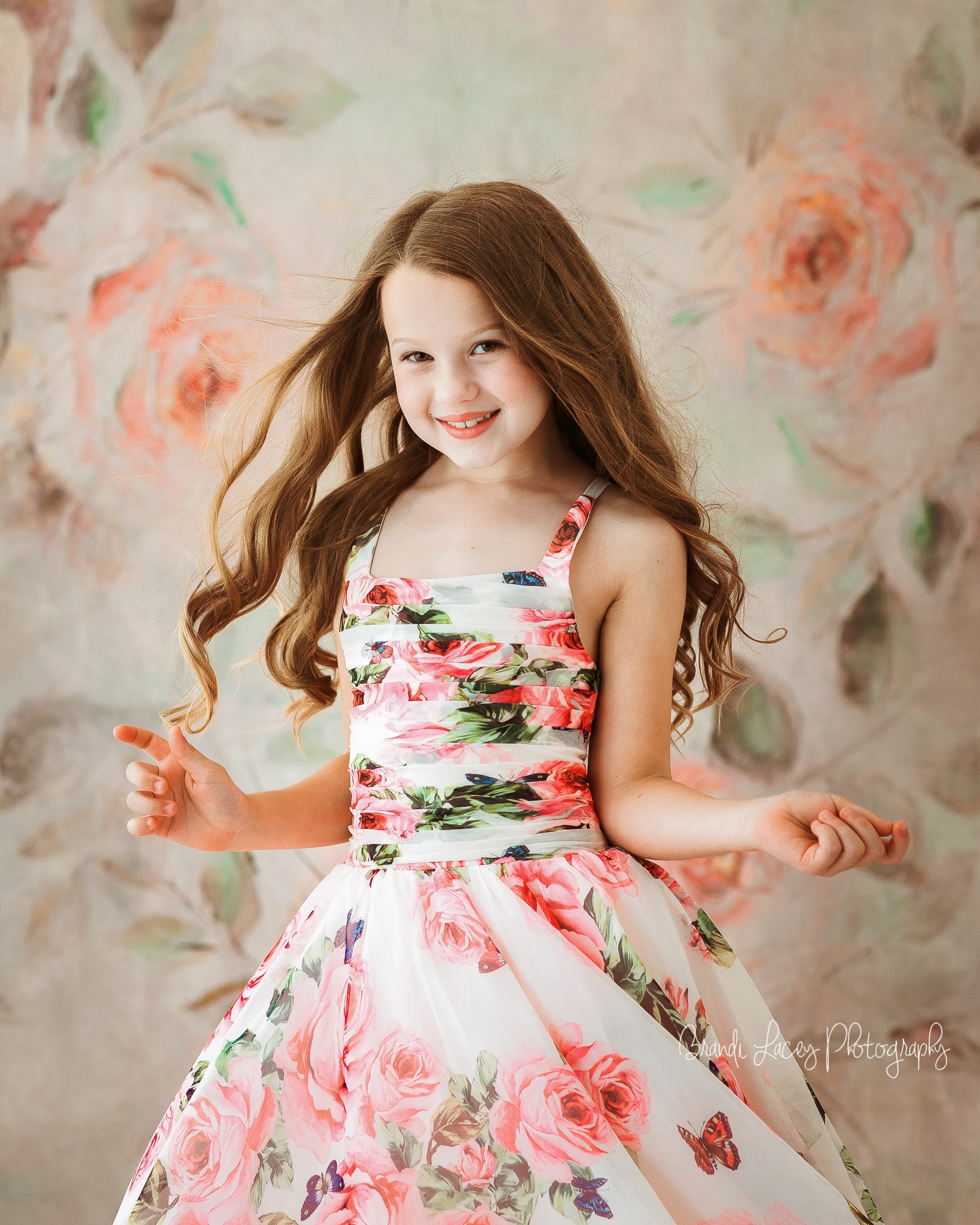 "Close-up of Ellie Butterfly Gown’s butterfly and floral chiffon fabric"