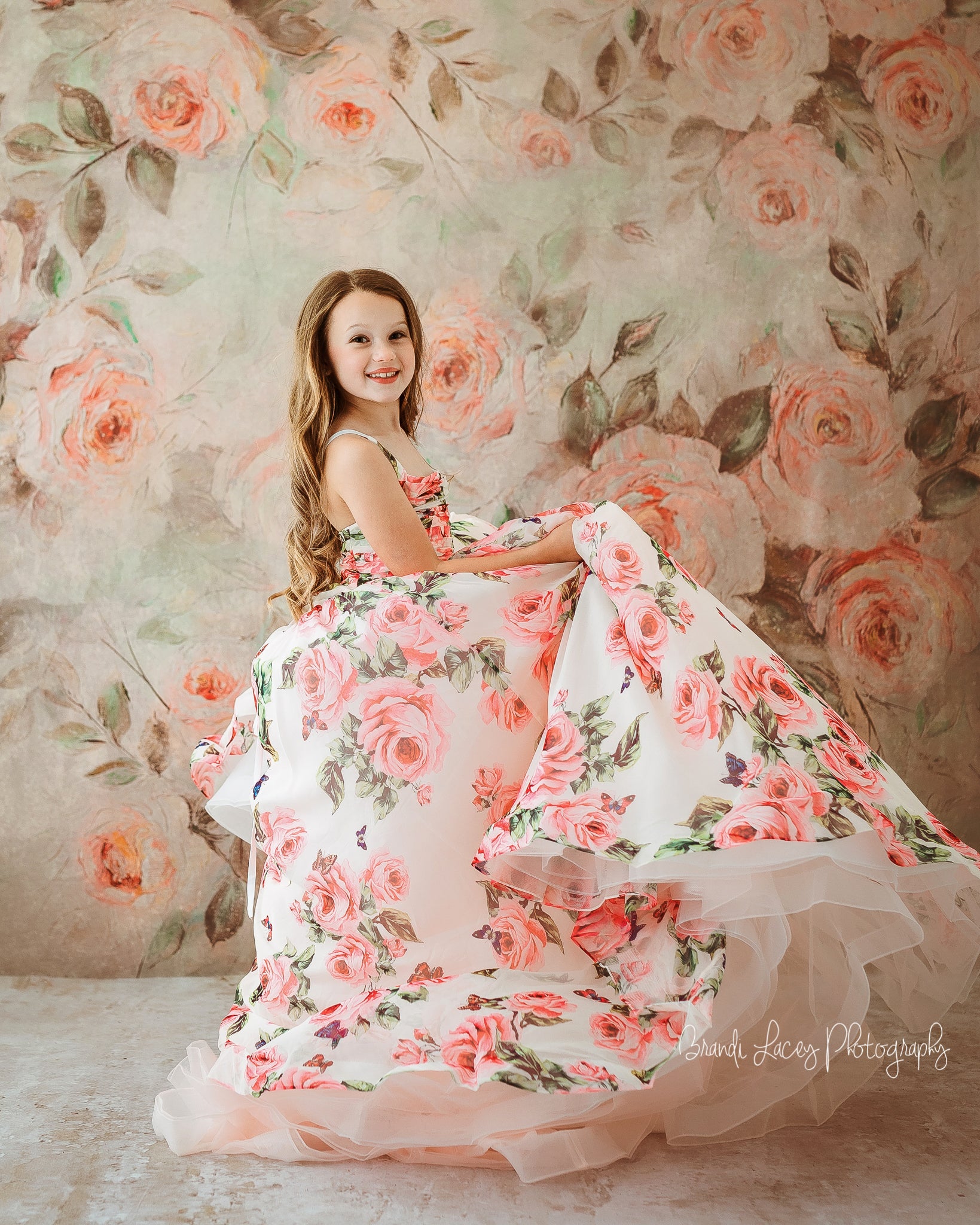 "Ellie Butterfly Gown in floral silk chiffon with adjustable shoulder ties"