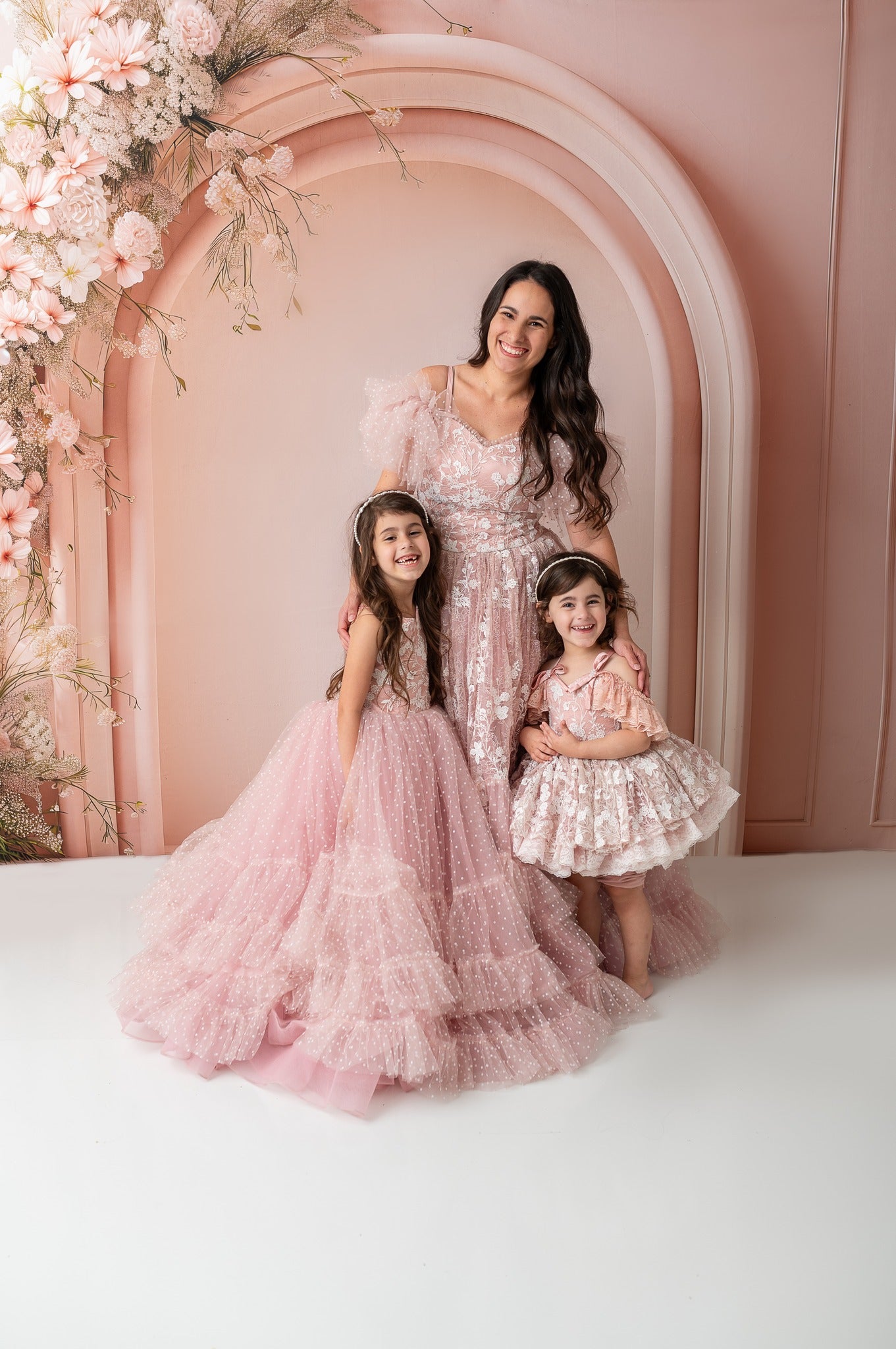 "Coordinated mother-daughter gowns for holidays, milestones, and elegant events."
