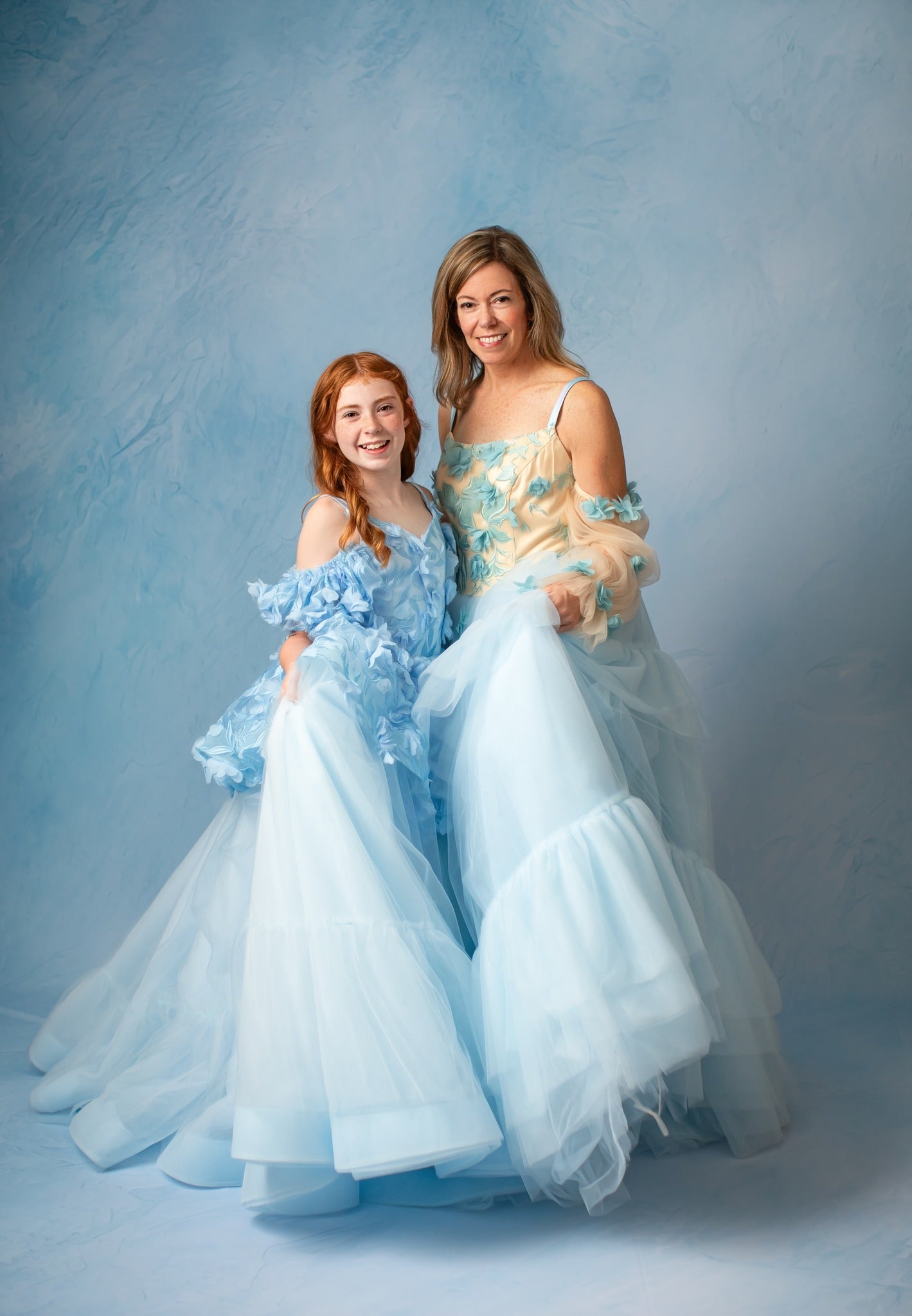 Adorable matching mommy and me gowns perfect for twinning moments!