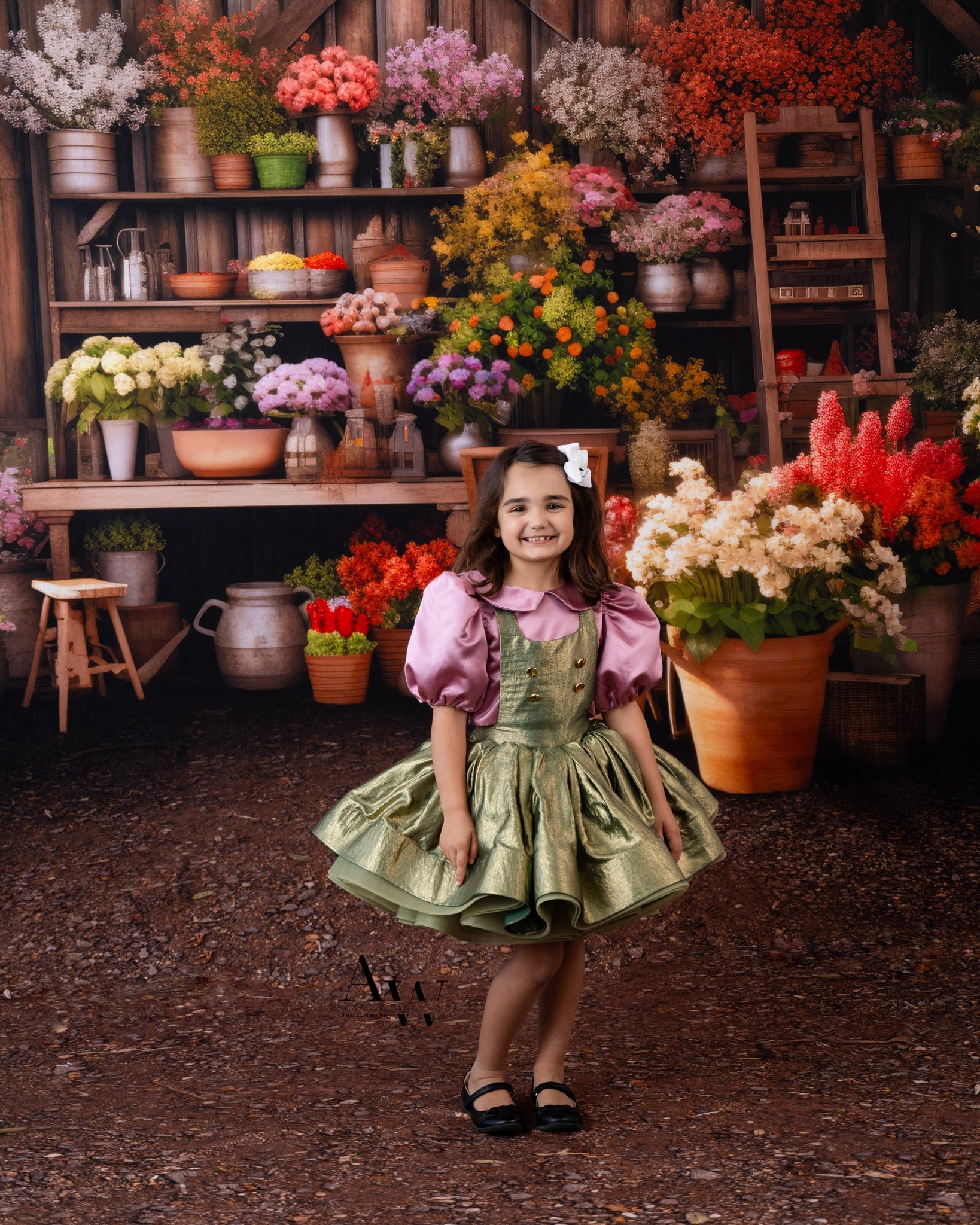 Young girl wearing a vintage inspired dress for a fruit stand photography backdrop- photography session.