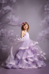 Handcrafted Cascade gown available in multiple colors for your dream event.

