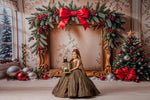 "Detail shot of a couture children's gown showcasing the rich jacquard pattern and delicate detachable tulle shoulder bows."

