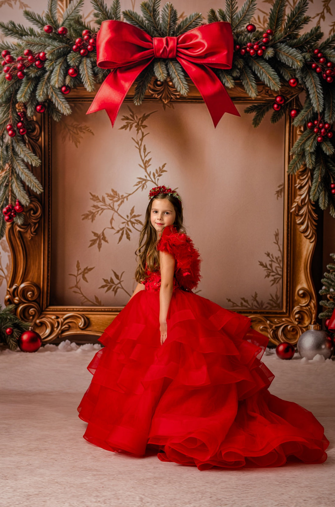 Close-up of red sequin bodice on Sadie gown captured in soft studio lighting.

