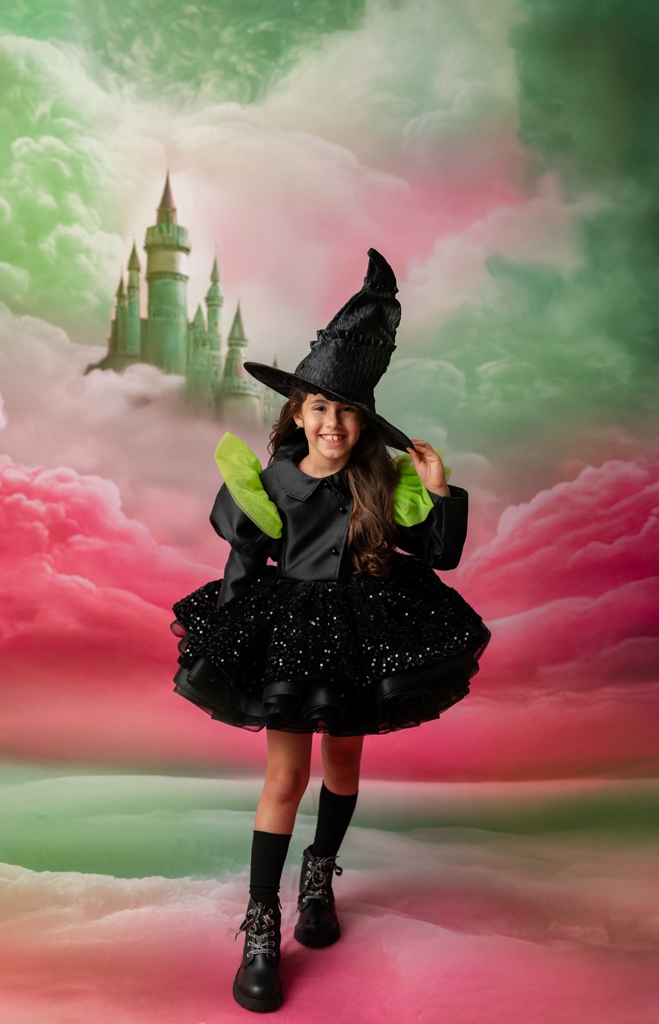 Person in a witch costume with a fantasy castle and colorful clouds in the background