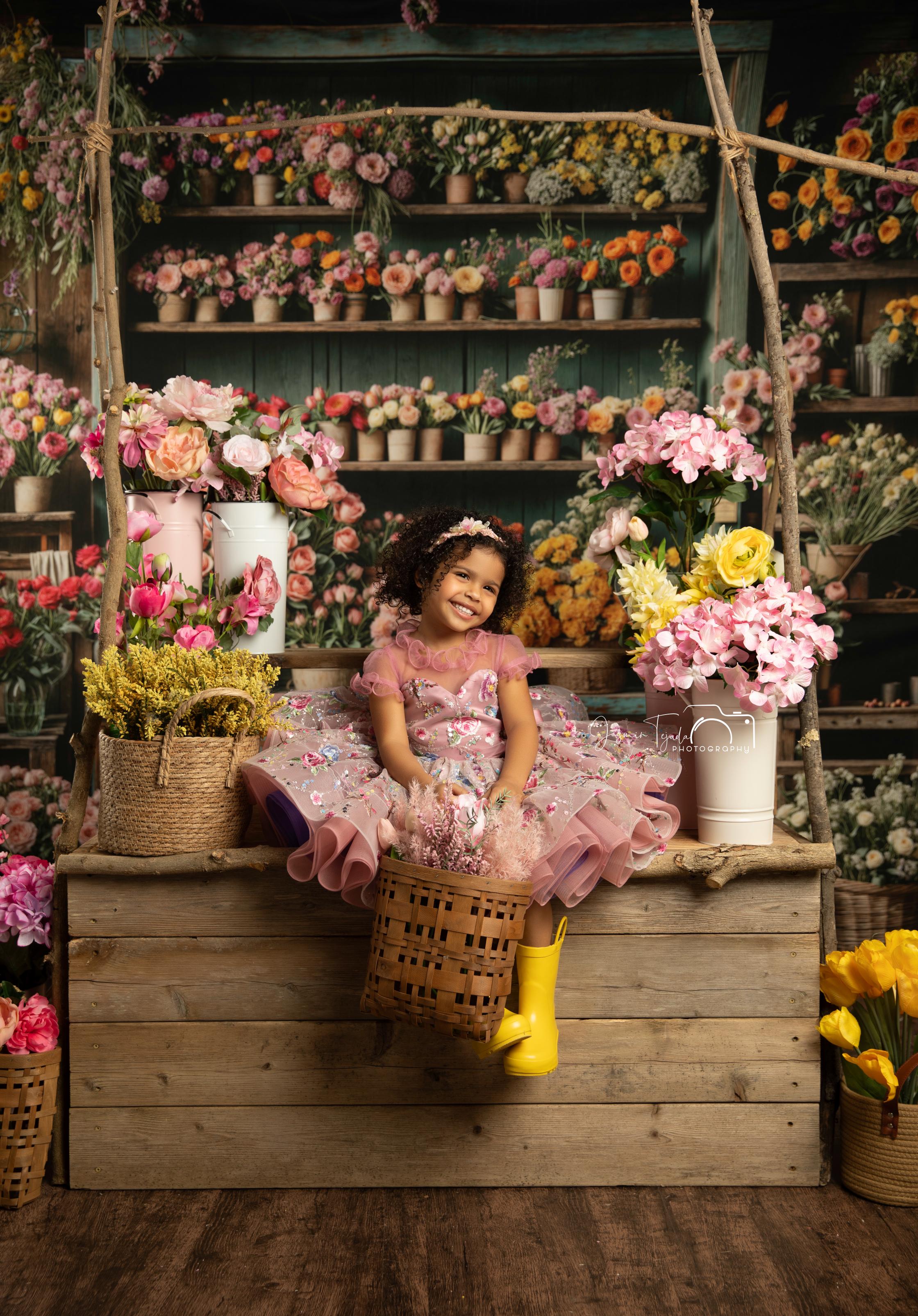 Elegant floral gown with cascading 3D blossoms and soft tulle layers, perfect for a dreamy photoshoot.
