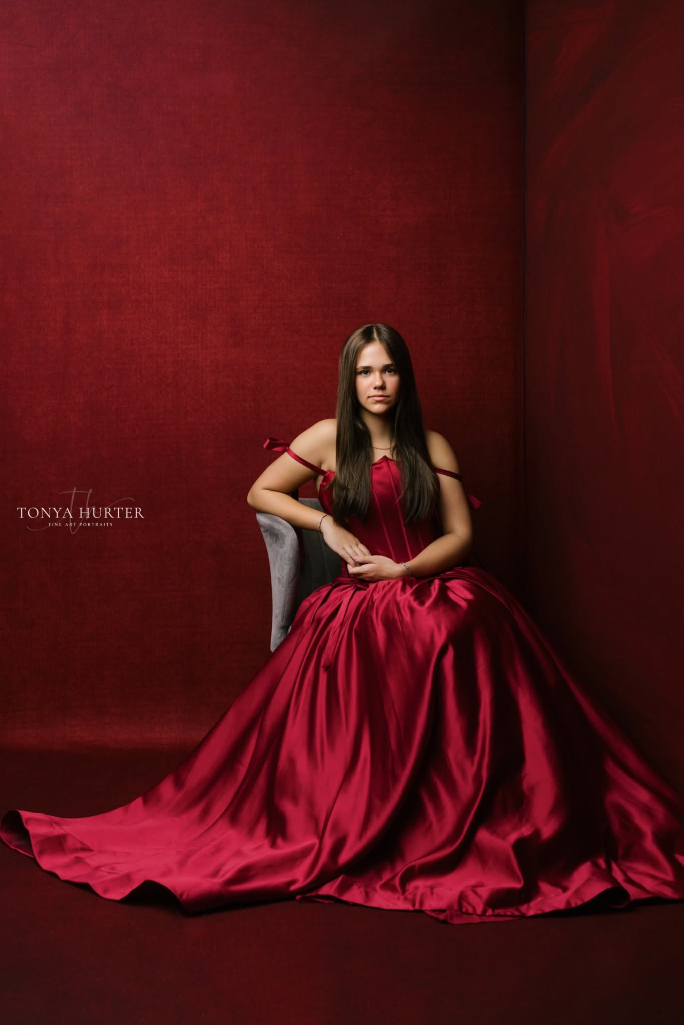 Red satin holiday gown with sweetheart neckline and full skirt
