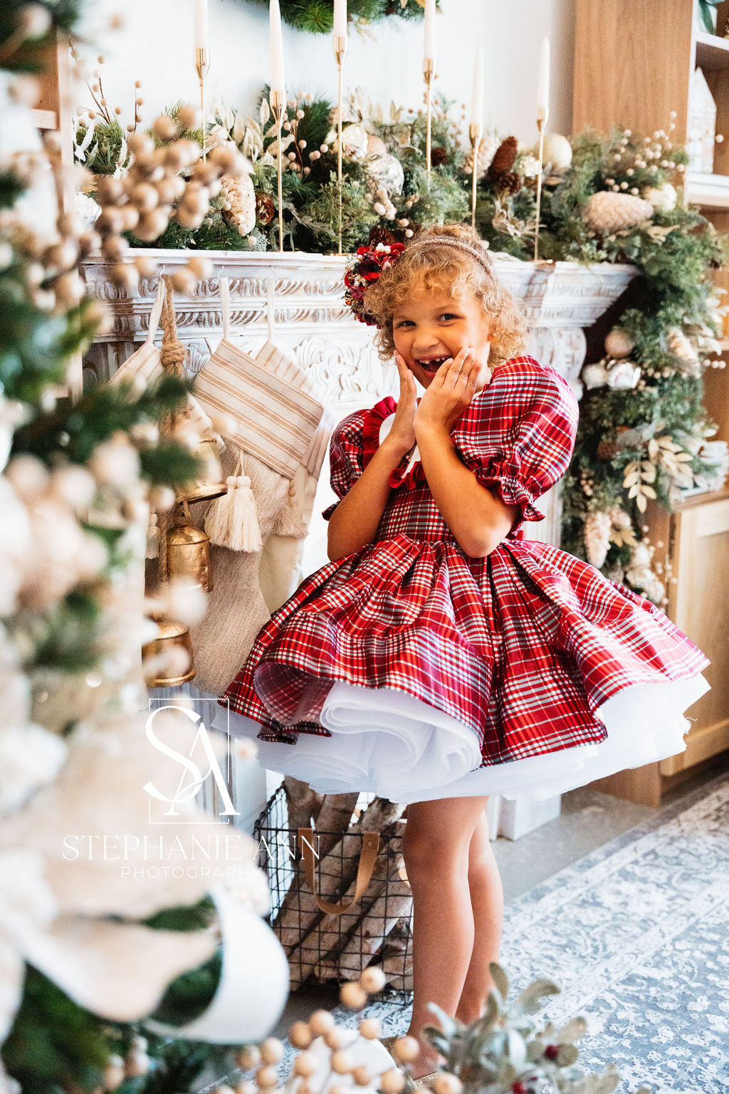 Girl posing in a beautifully designed gown, perfect for special occasions.
