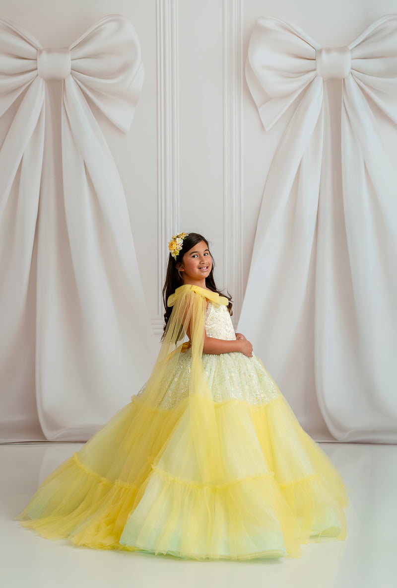 Full view of yellow and pale blue ombré Harmony gown in soft natural light

