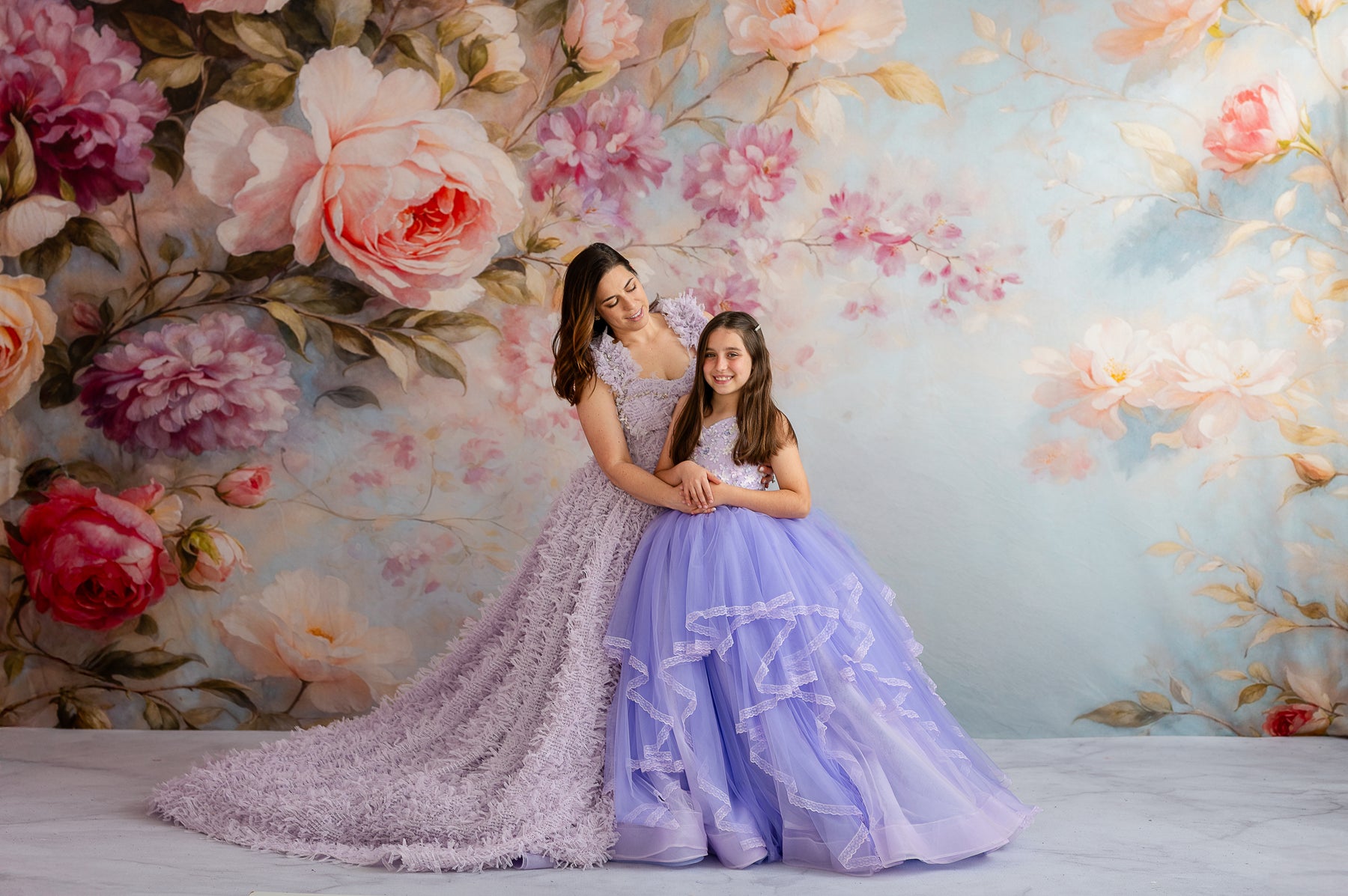 Custom couture gowns, flower girl dresses, and made to order dresses