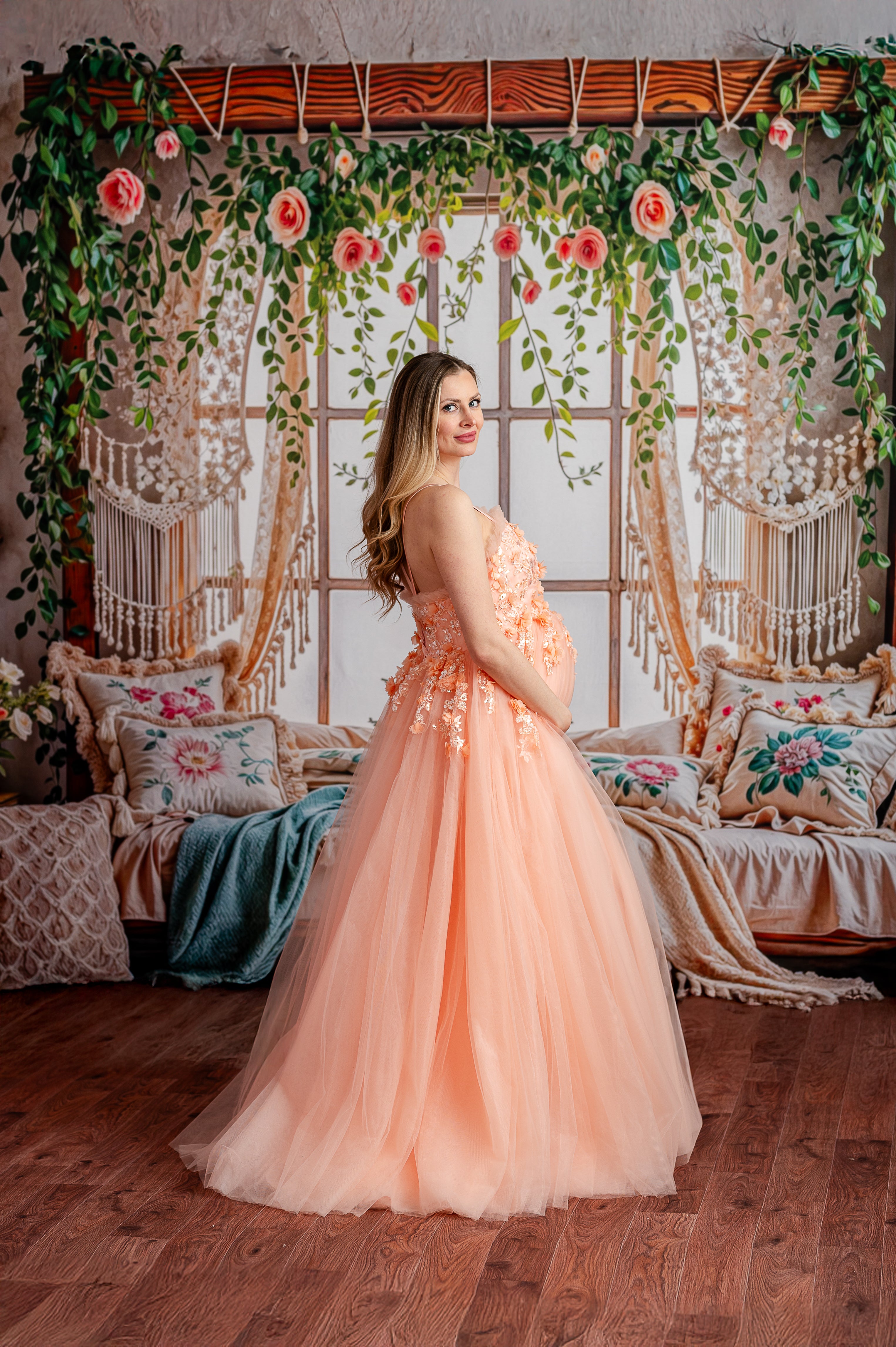 "Peach Blossom Gown featuring adjustable corset back, designed for both maternity and non-maternity wear, with flowing tulle layers for graceful movement."
