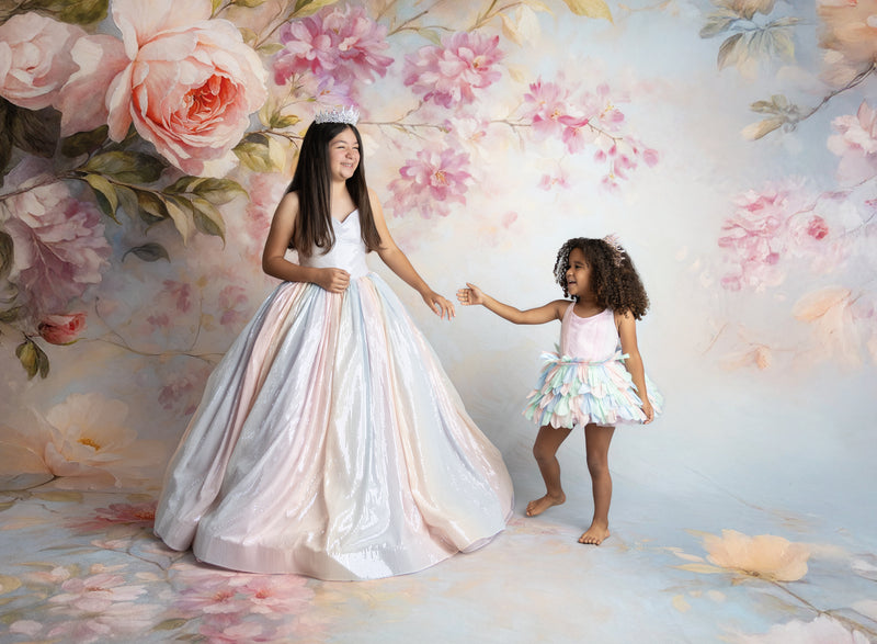 Young model smiling in the Aurora Gleam Gown during a styled fine art photo session


