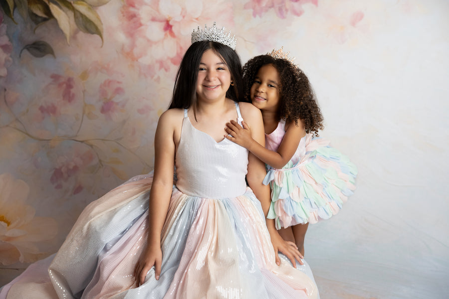 Pastel ombré Aurora Gleam Gown styled with a floral crown for a dreamy photoshoot look

