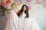 Child wearing the Aurora Gleam Gown in natural light, showcasing shimmering pastel tones

