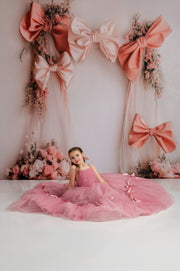 "Flattering silhouette and adjustable shoulder ties for a perfect fit in the Bows of Grace gown."
