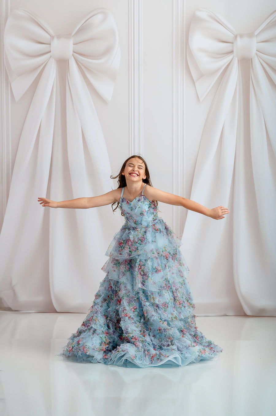 Back view of Fancy Mae gown showing bow-tied shoulder straps

