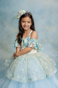 "Close-up of the peplum skirt on the Trésor Caché gown showing playful elegance"

