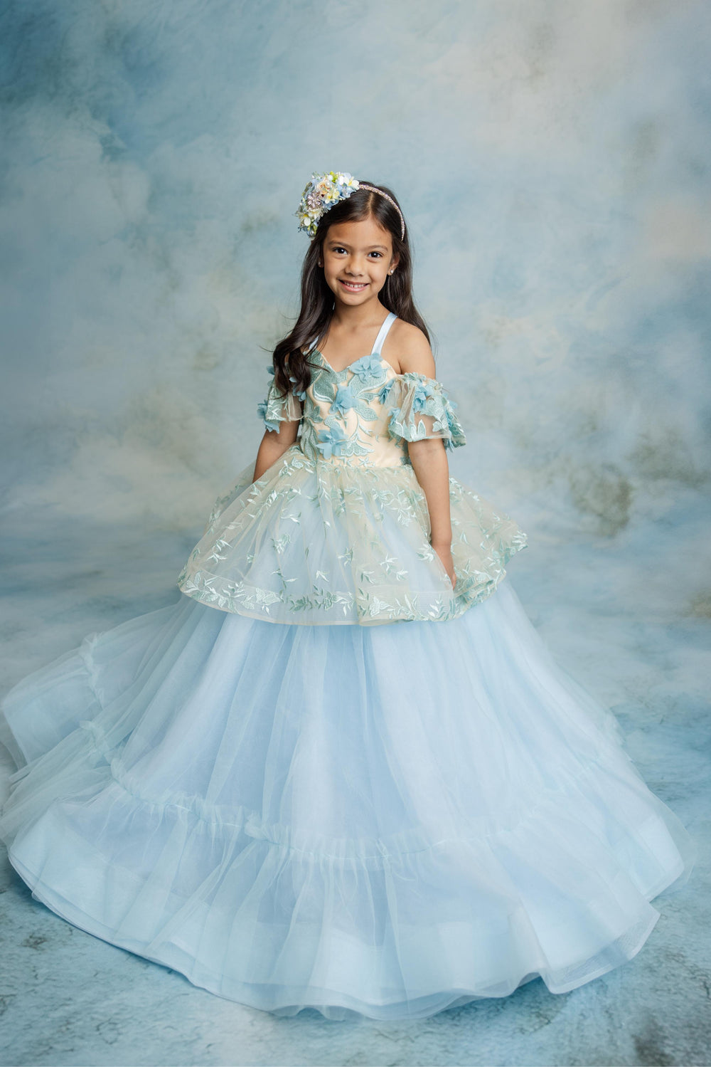 "Trésor Caché gown peplum skirt featuring sculpted layers for a whimsical touch"


