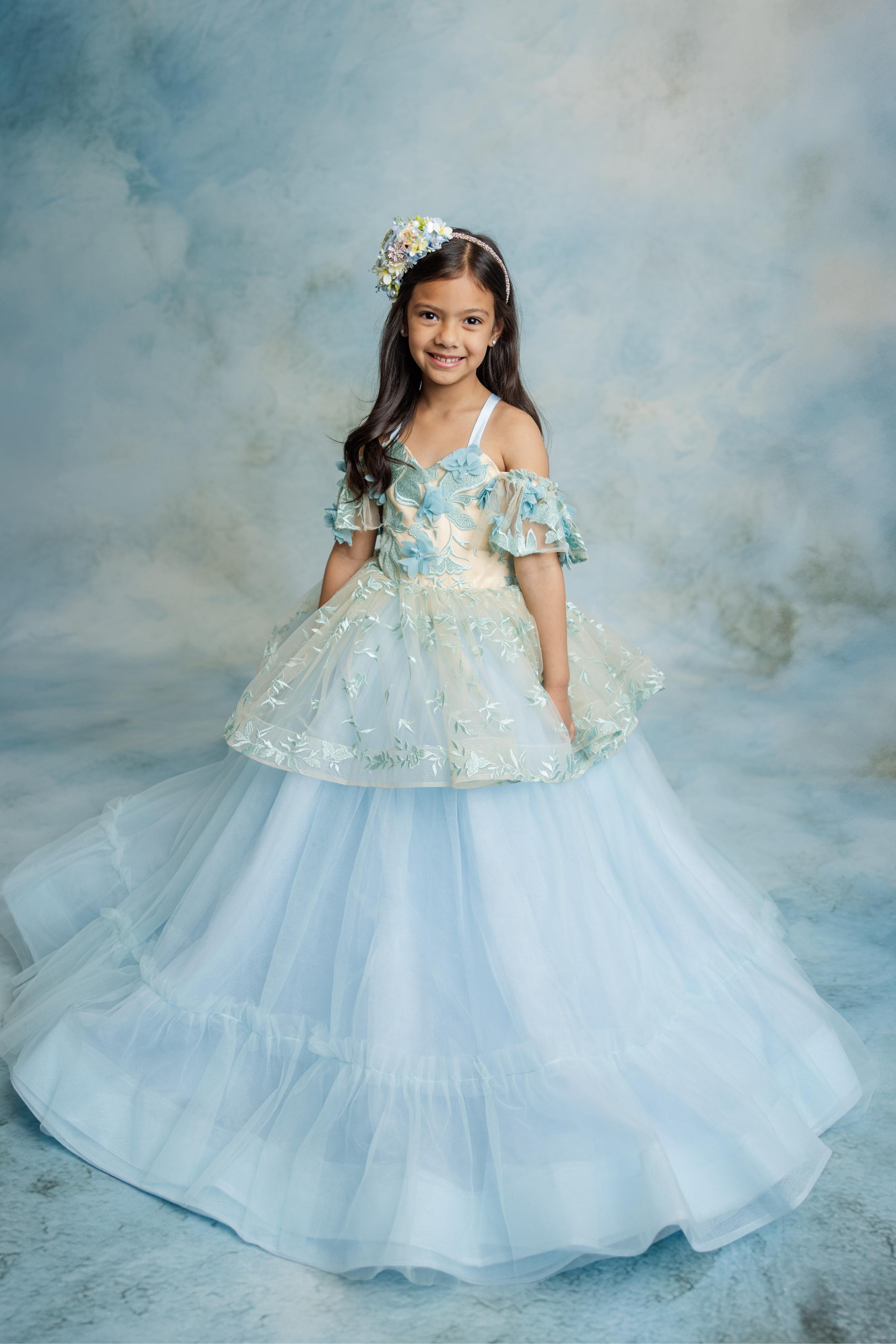 "Trésor Caché gown peplum skirt featuring sculpted layers for a whimsical touch"

