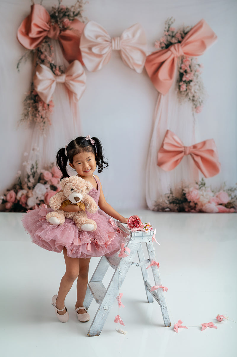 Charming pink ballet-inspired tutu with delicate polka dot layers.

