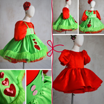 Holiday-themed Grinch dress with playful apron and adjustable accessories