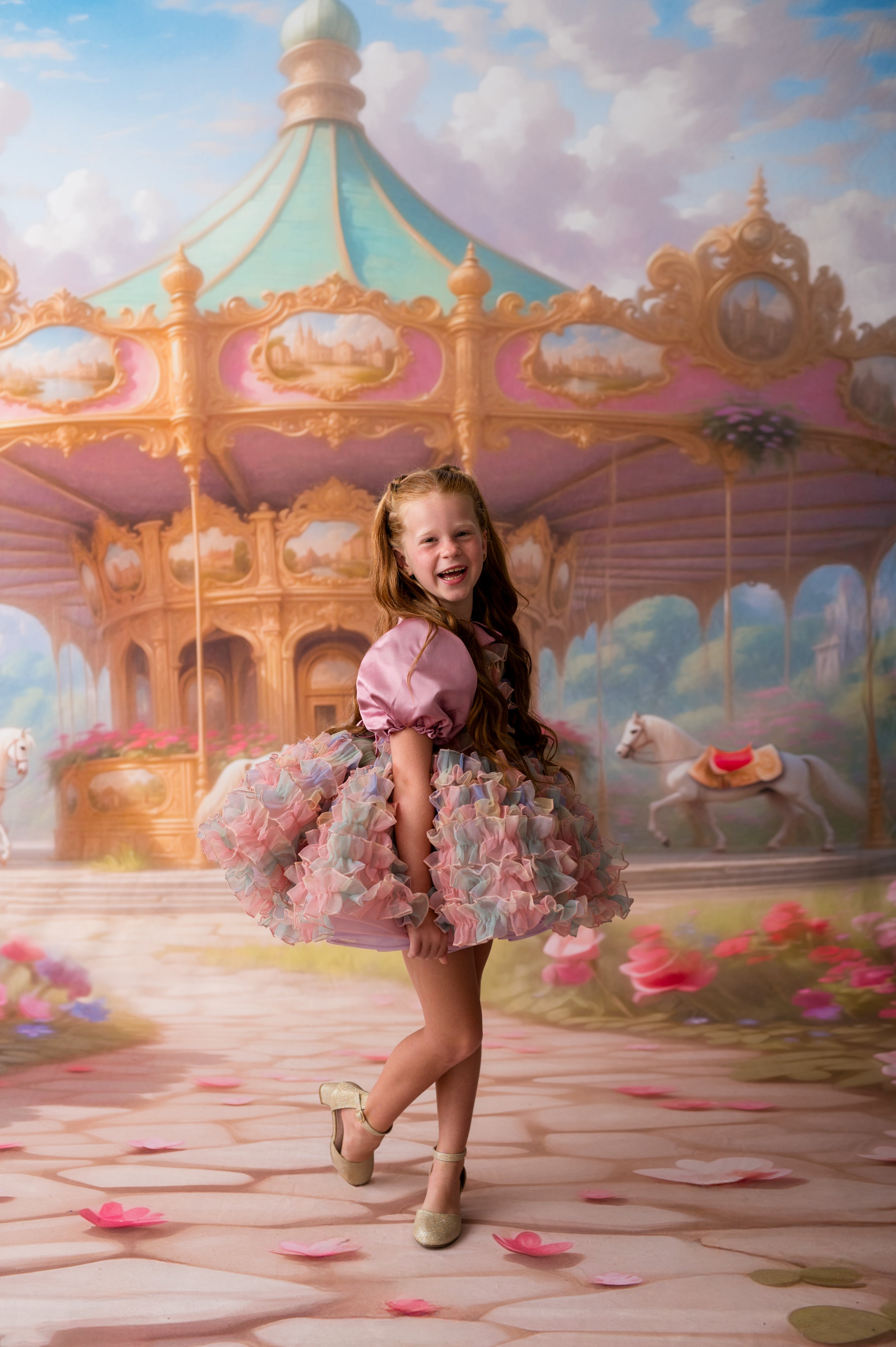 Young girl in a floral dress standing in front of a colorful carousel with a fantasy background.
