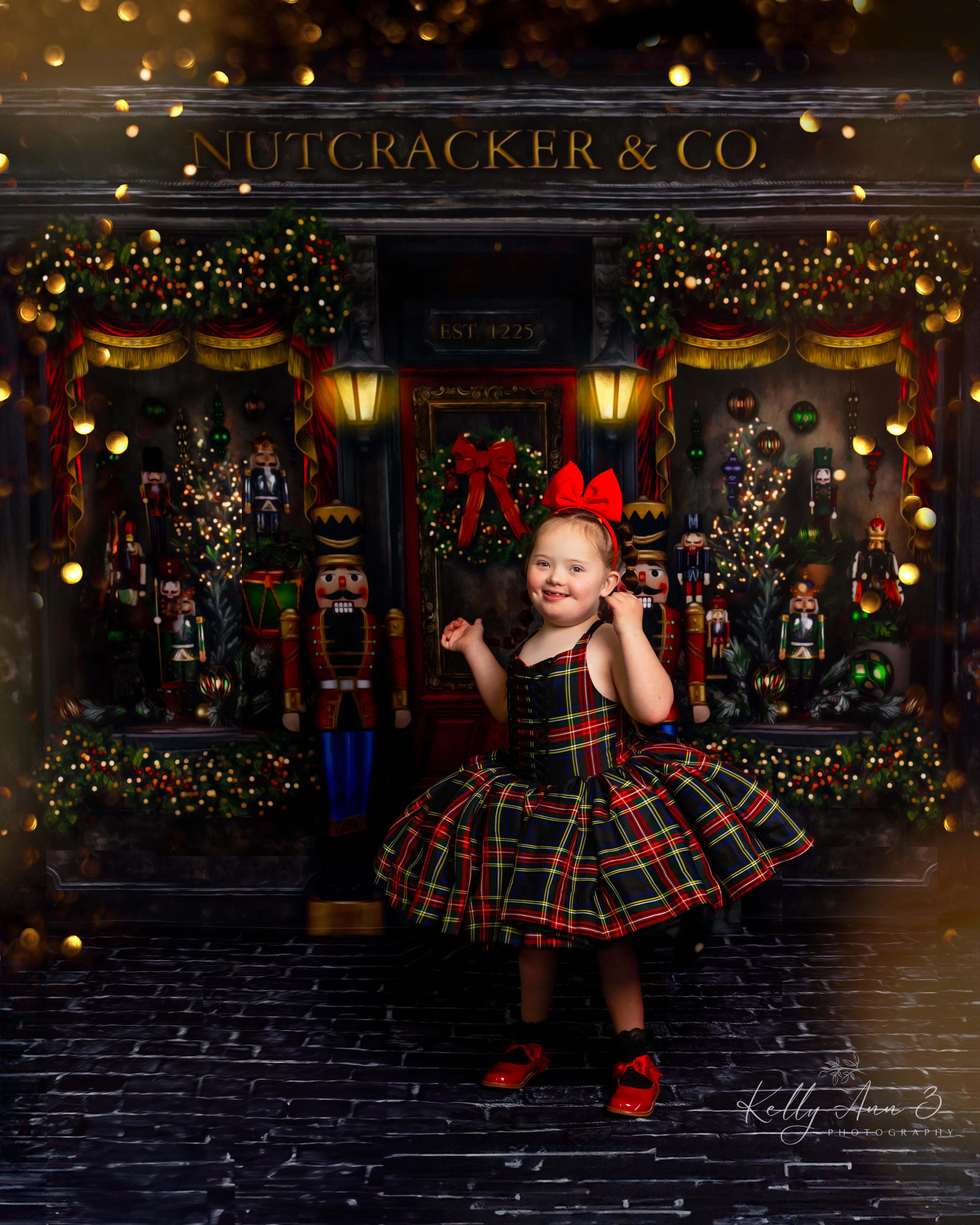 Young girl in a Nutcracker-themed setting with 'Nutcracker & Co.' branding.