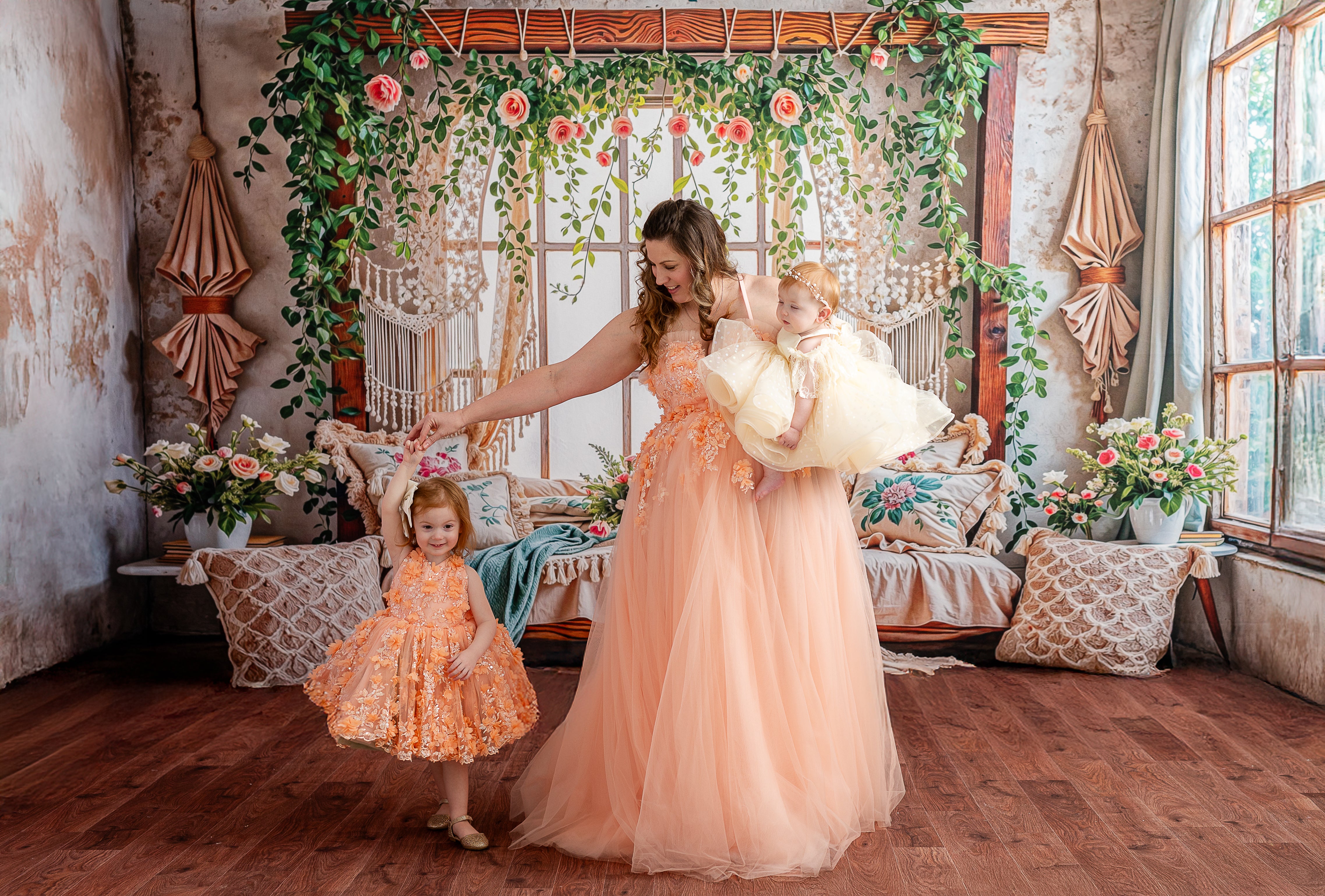 "Graceful Peach Blossom Gown designed with a flexible corset back and flowing tulle for an elegant look and comfortable fit."
