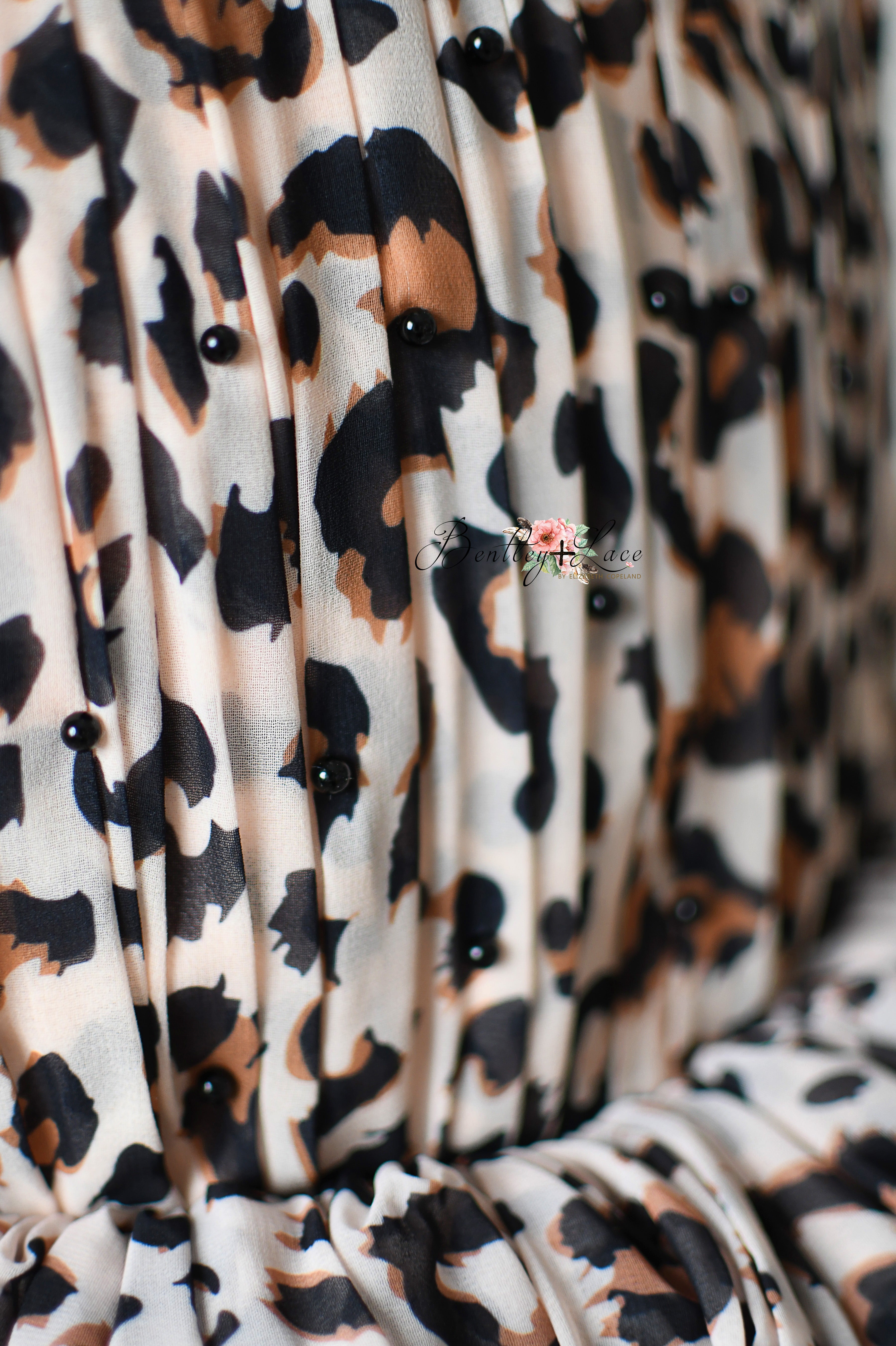 "Versatile leopard print dress with removable sleeves for birthdays and events."
