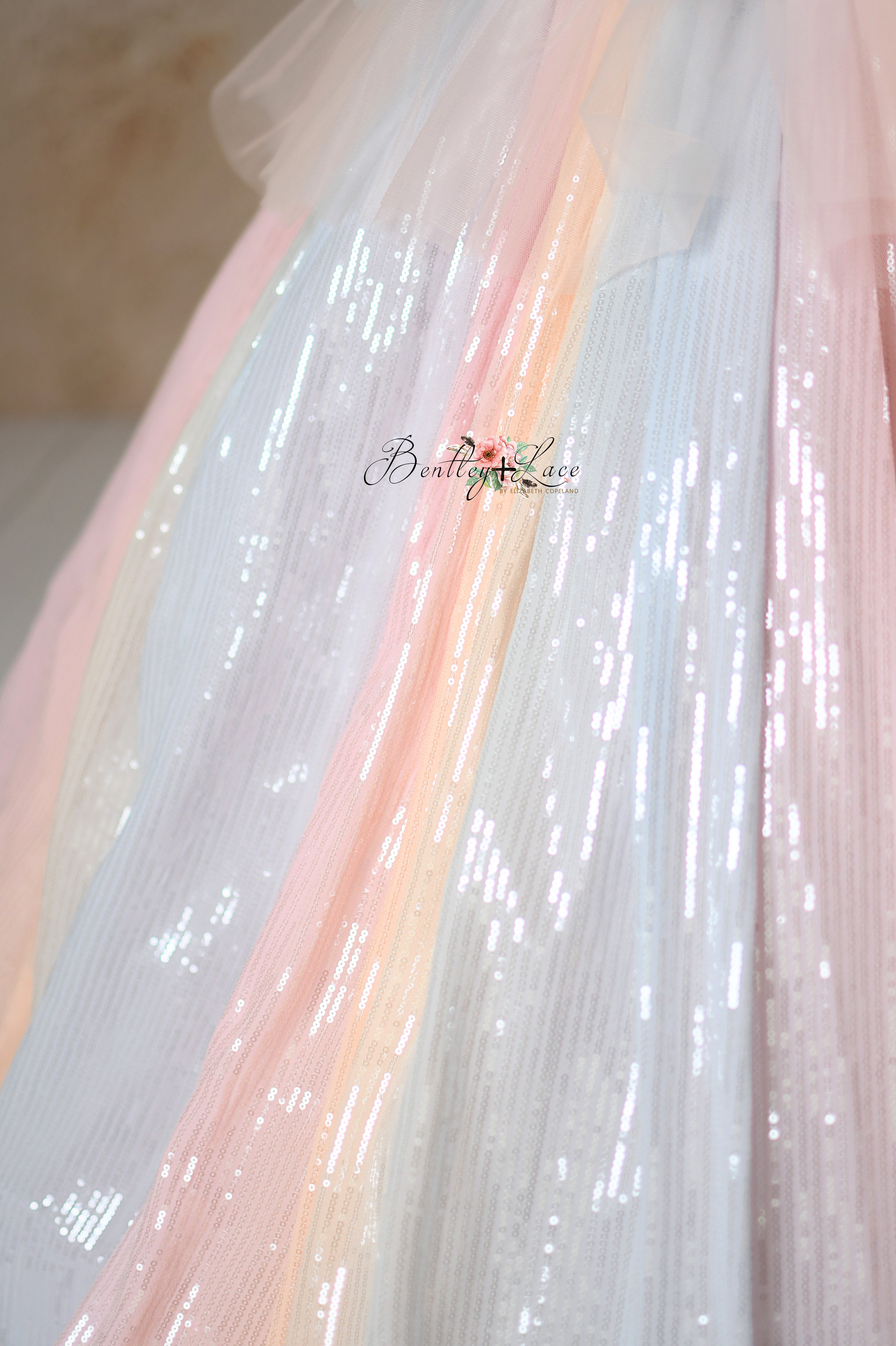 Light-catching pastel dress with a fully lined skirt and crinoline.
