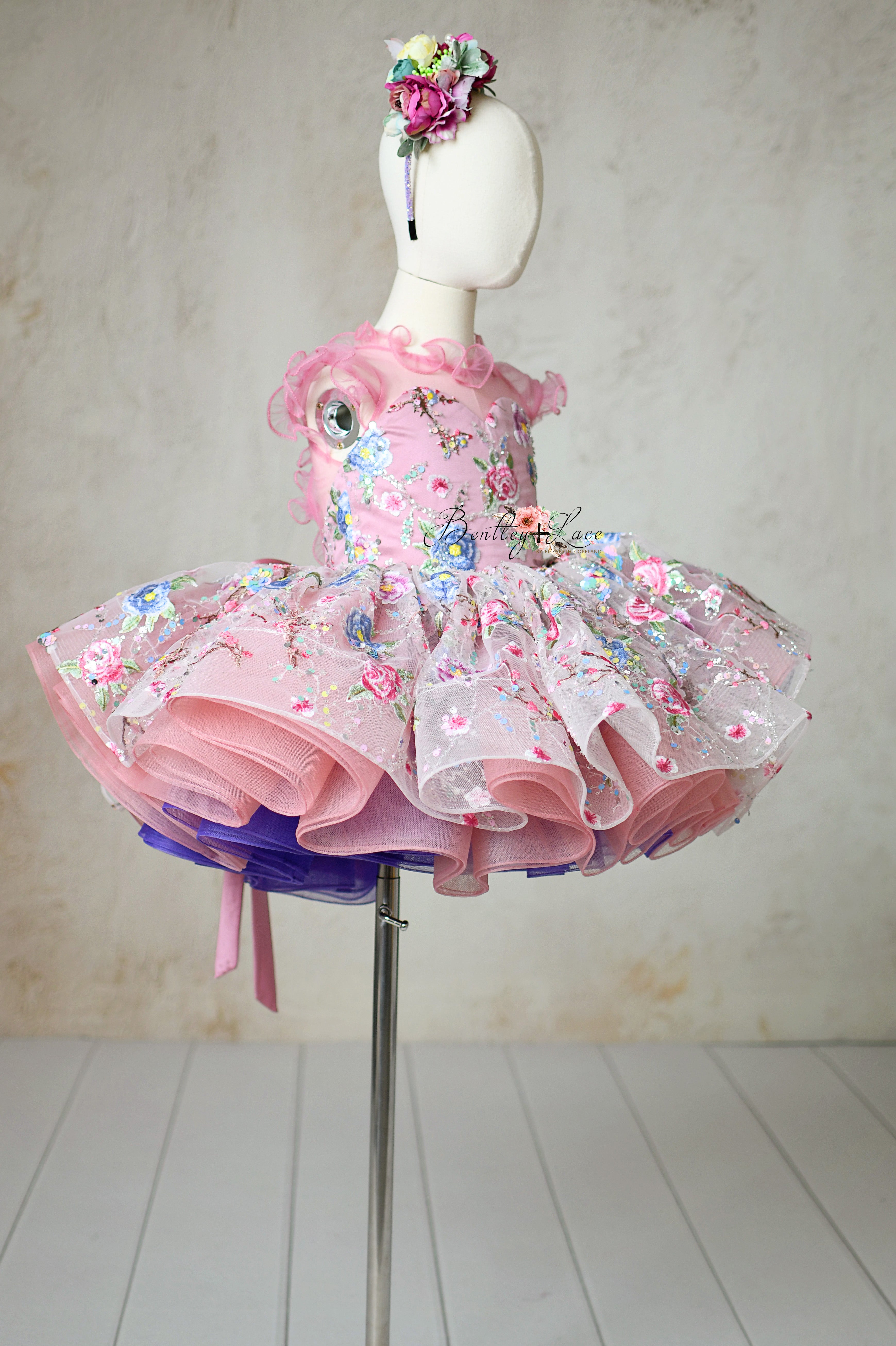 Blush pink and purple petal length dress with a sparkling cherry blossom sequin tulle skirt.
