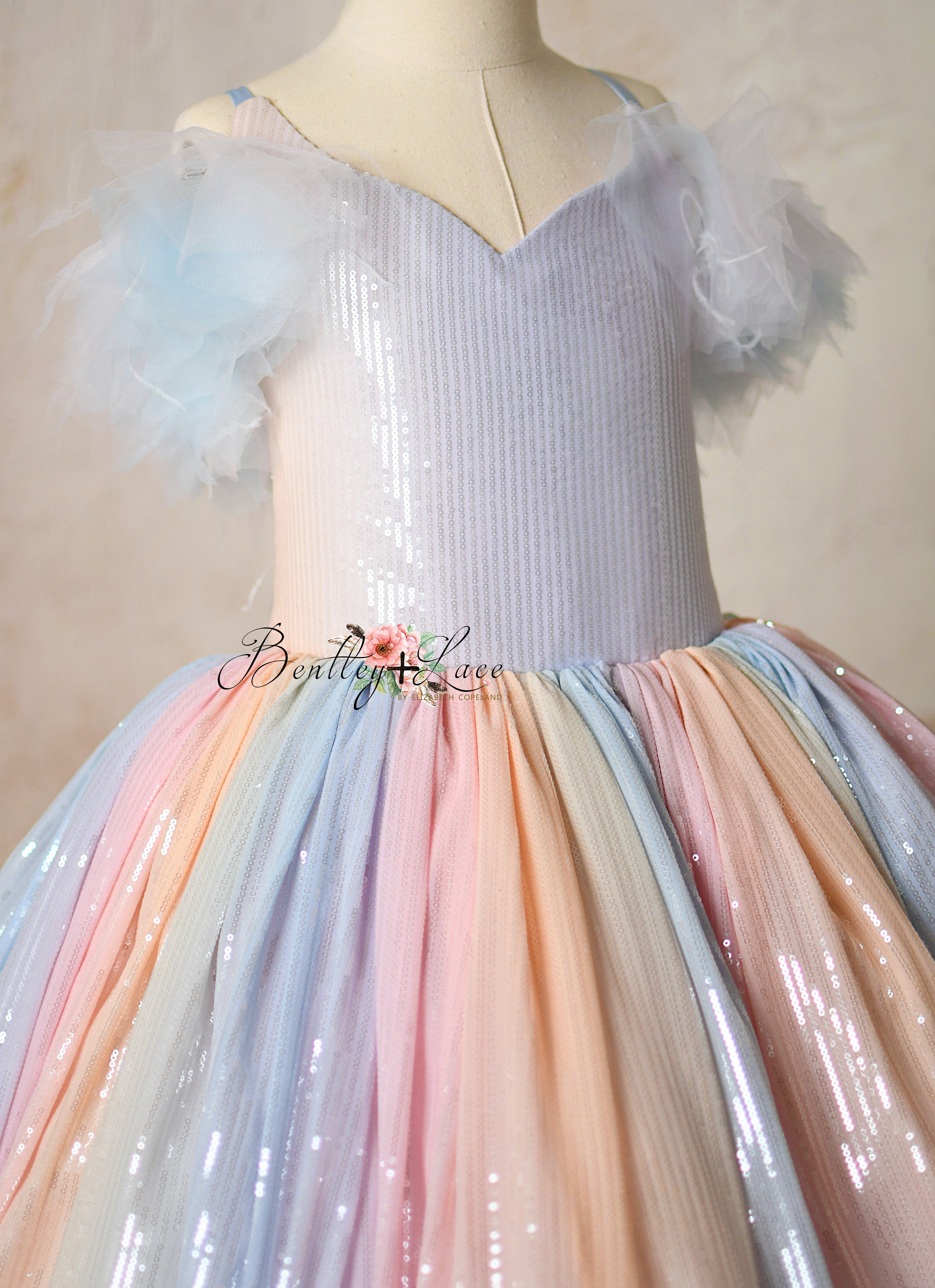 Close-up of crinoline-lined skirt, providing volume to the Aurora Gleam gown.
