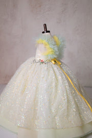 Let your little one shine in the Harmony Gown, a couture masterpiece with delicate lace, ethereal pastels, and a dreamy full skirt.

