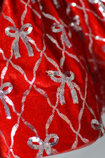 High-end couture holiday dress for styled photo sessions and winter celebrations.

