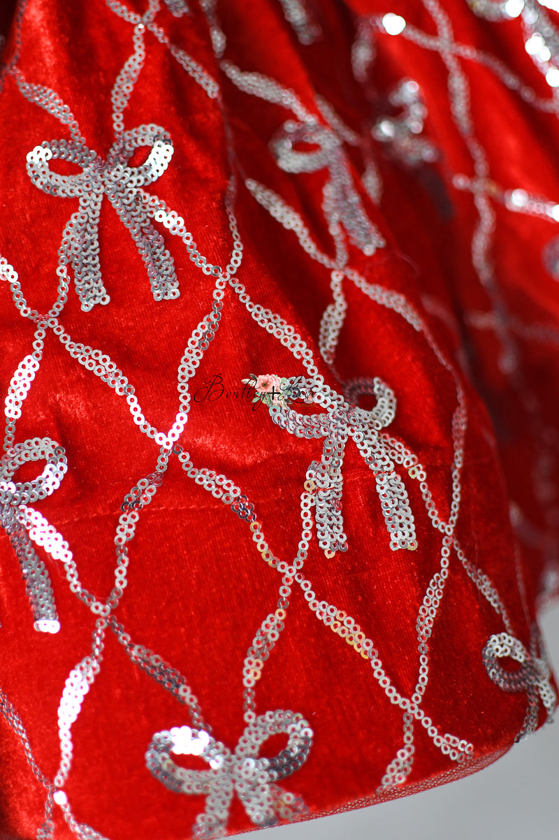 High-end couture holiday dress for styled photo sessions and winter celebrations.

