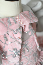 "Luxury toddler dress with bows and satin puff sleeves"

