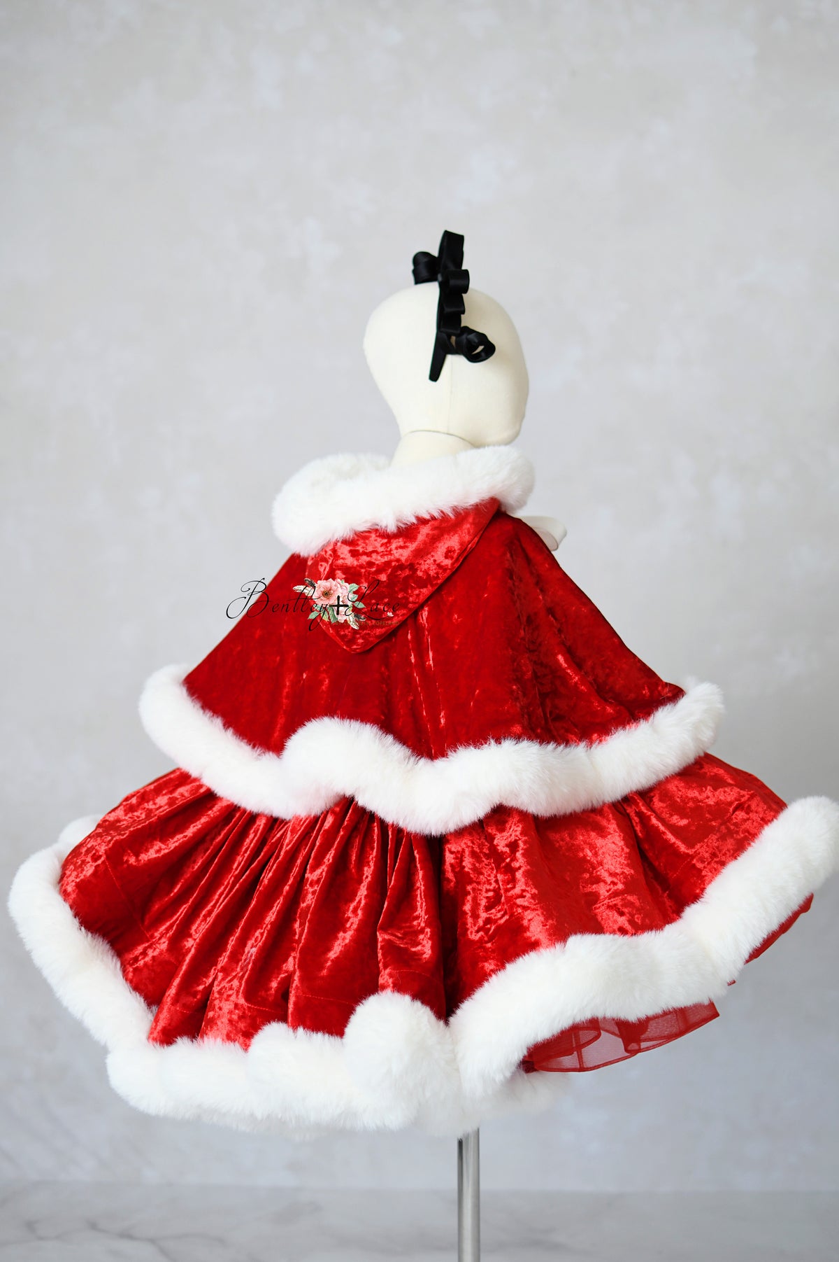 Back view of Mrs. Claus dress set styled for Christmas minis

