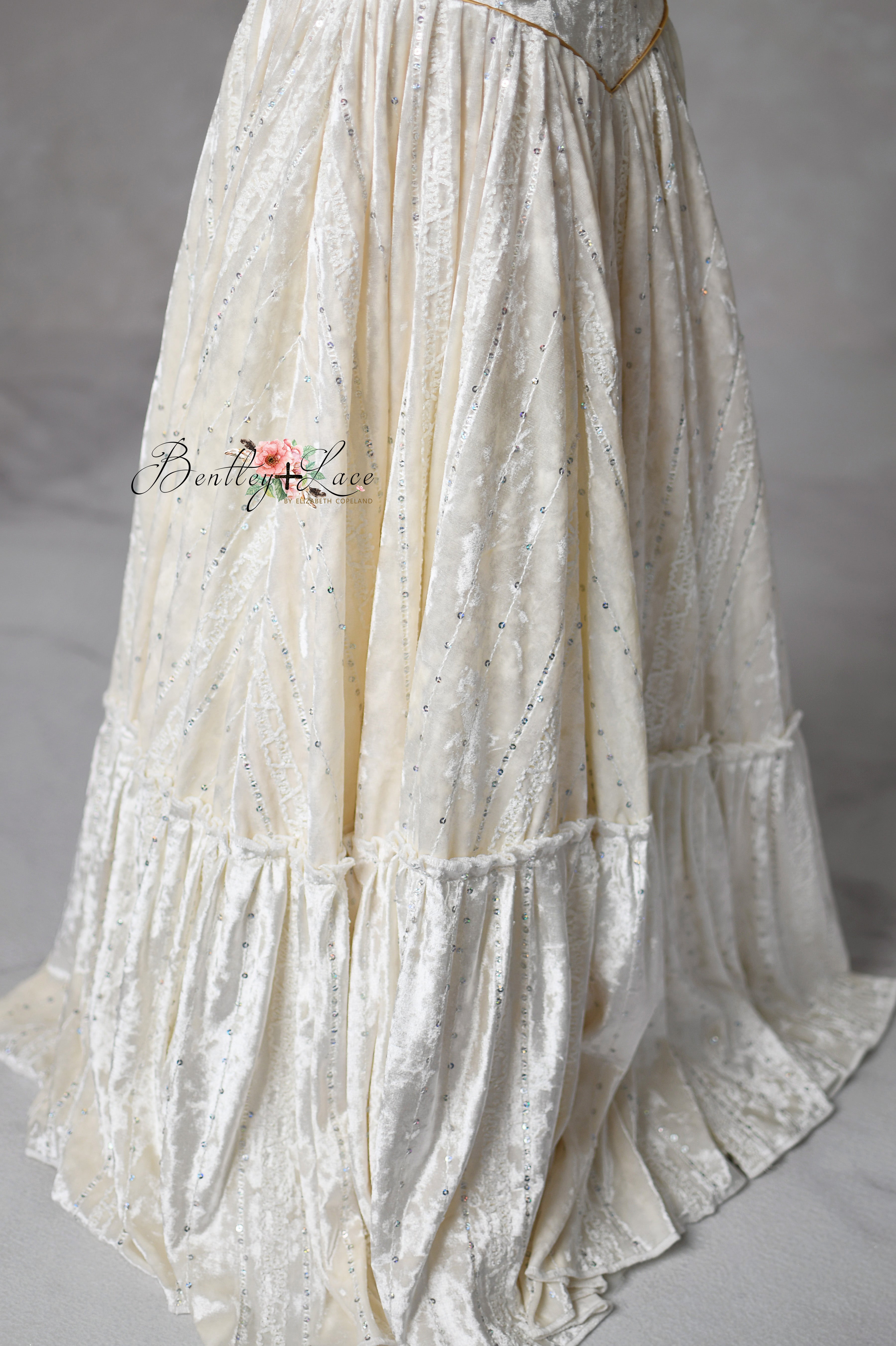 Full-length portrait of child in Clara’s Dream gown for photo shoot

