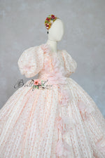"Blush pink couture girls gown with 3D floral appliqués and full skirt"

