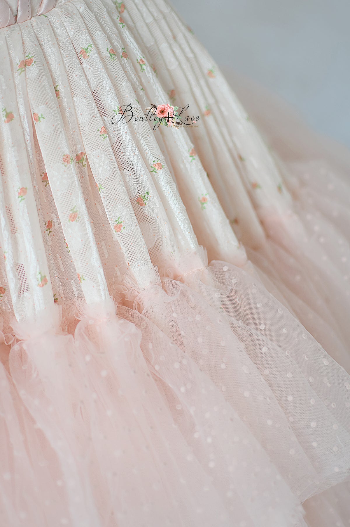 Chiffon and tulle formal gown with structured bodice and romantic movement.


