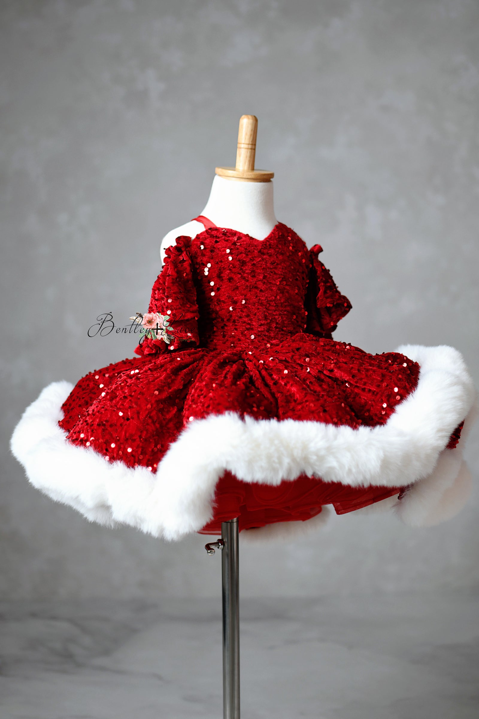 Couture dress styled with oversized bow and velvet texture

