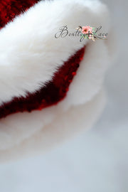 Short couture dress with shimmering petals and soft fur trim

