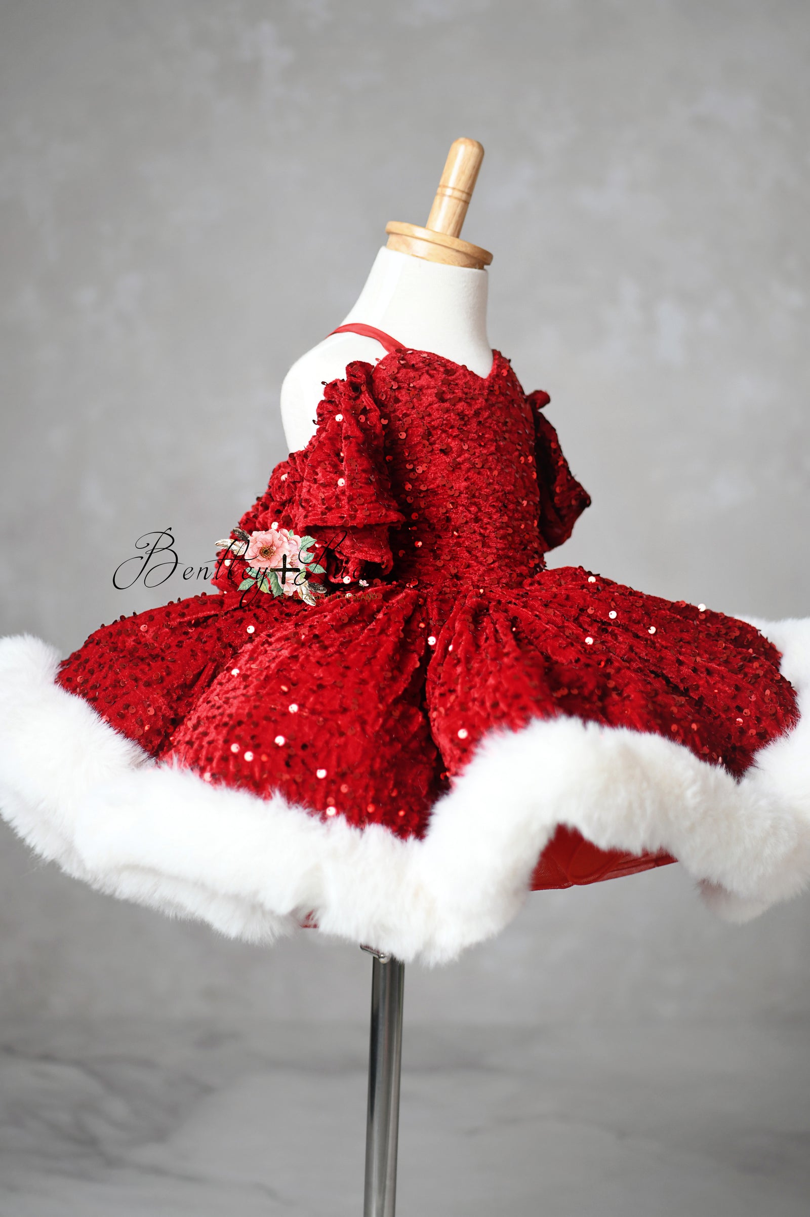 Holiday gown in pastel velvet with shimmering petal overlay

