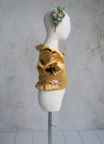 Back view of the Golden Belle dress showing elastic back detail.
