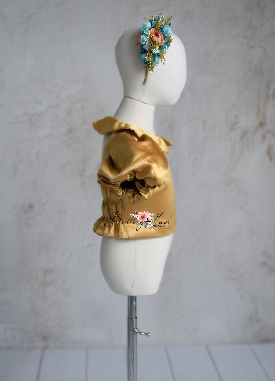 Back view of the Golden Belle dress showing elastic back detail.