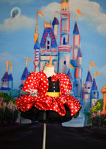 Close-up of the "Miss Mouse" dress featuring classic polka dots and a detachable jacket for added charm.