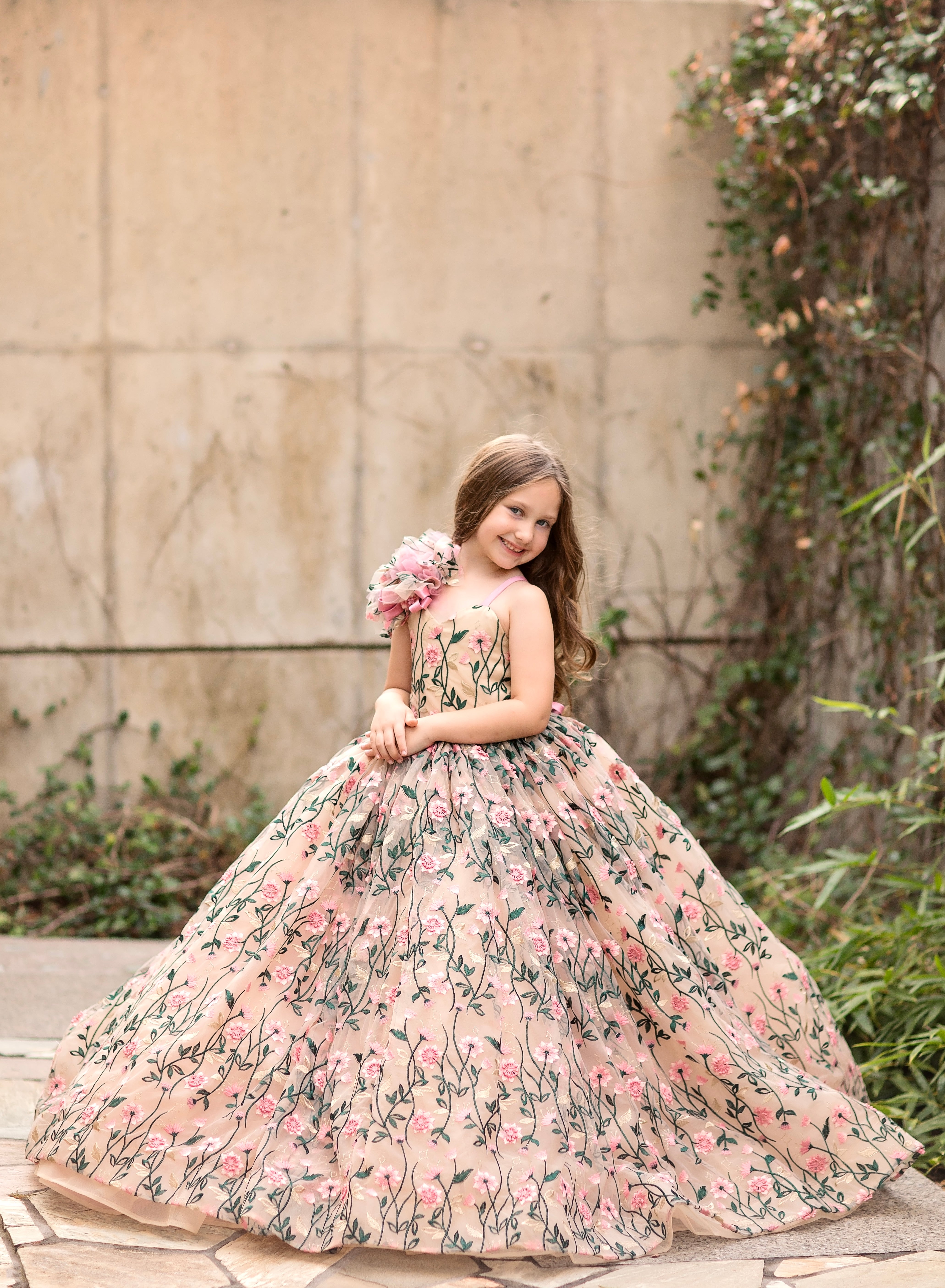 girl wearing a beautiful flower gown 