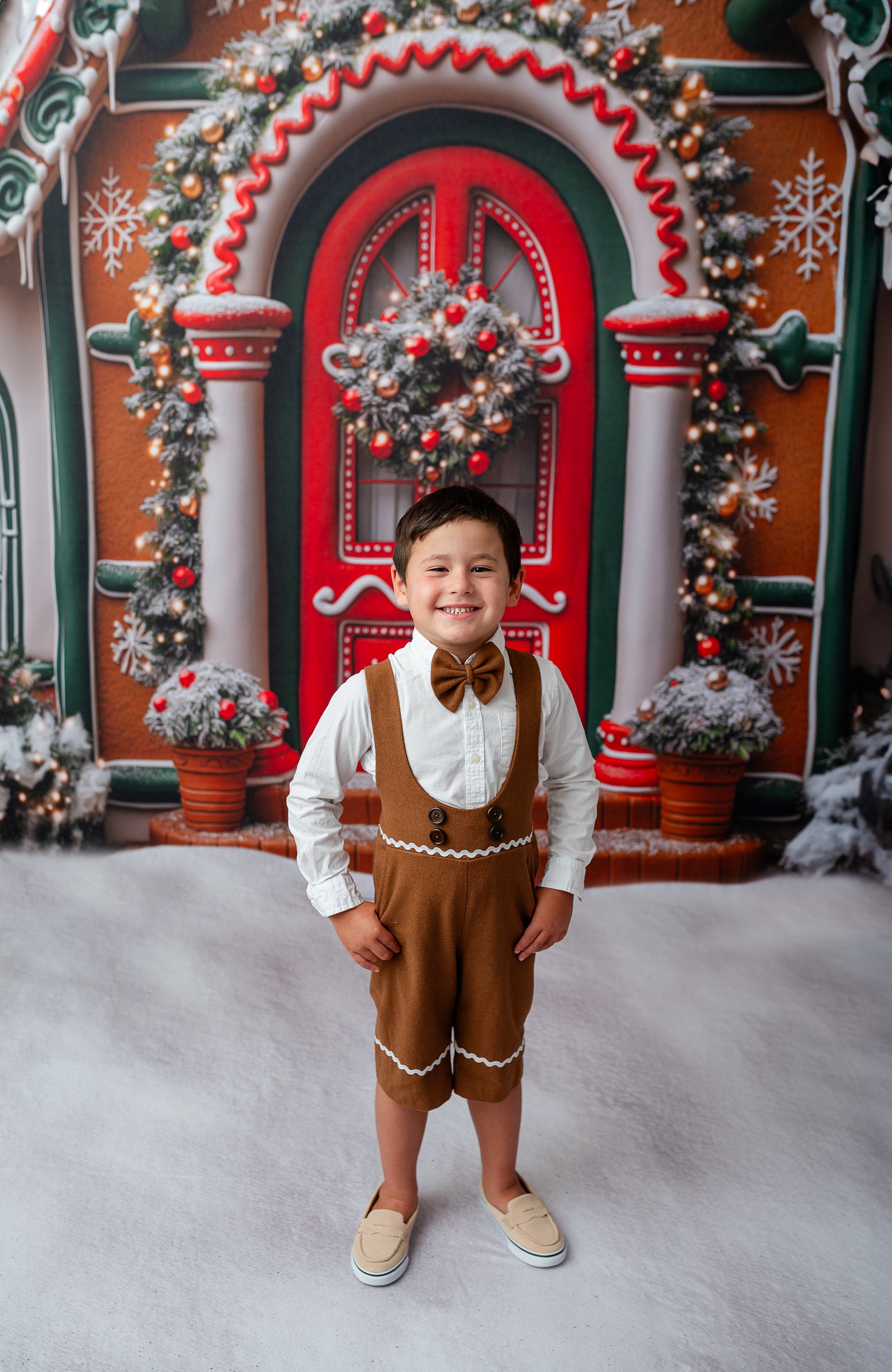 boy wearing custom gingerbread suspender shorts