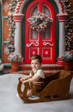 baby boy wearing gingerbread themed suspender shorts